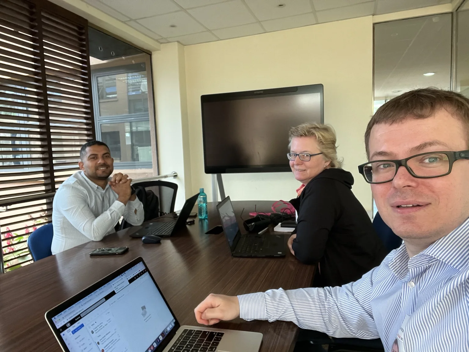 Aleksandr Shestakov with Silvia Ragoss and Ahmed Zenari during the post-WUF11 workshop