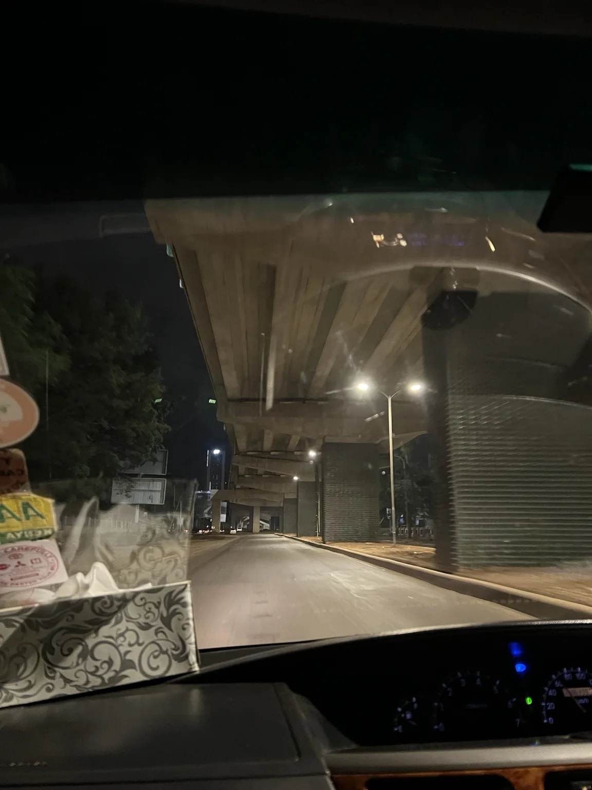 Night road in Nairobi photographed from a taxi