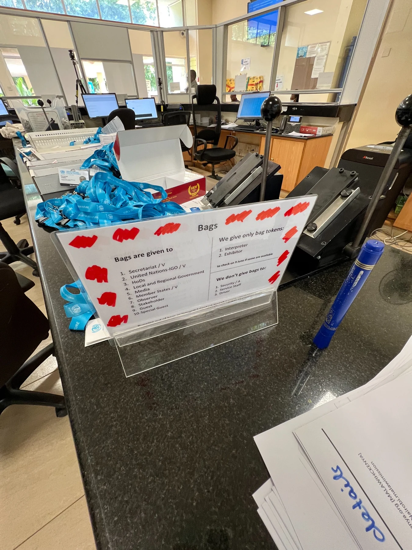 Backstage registration preparation with physical process signage