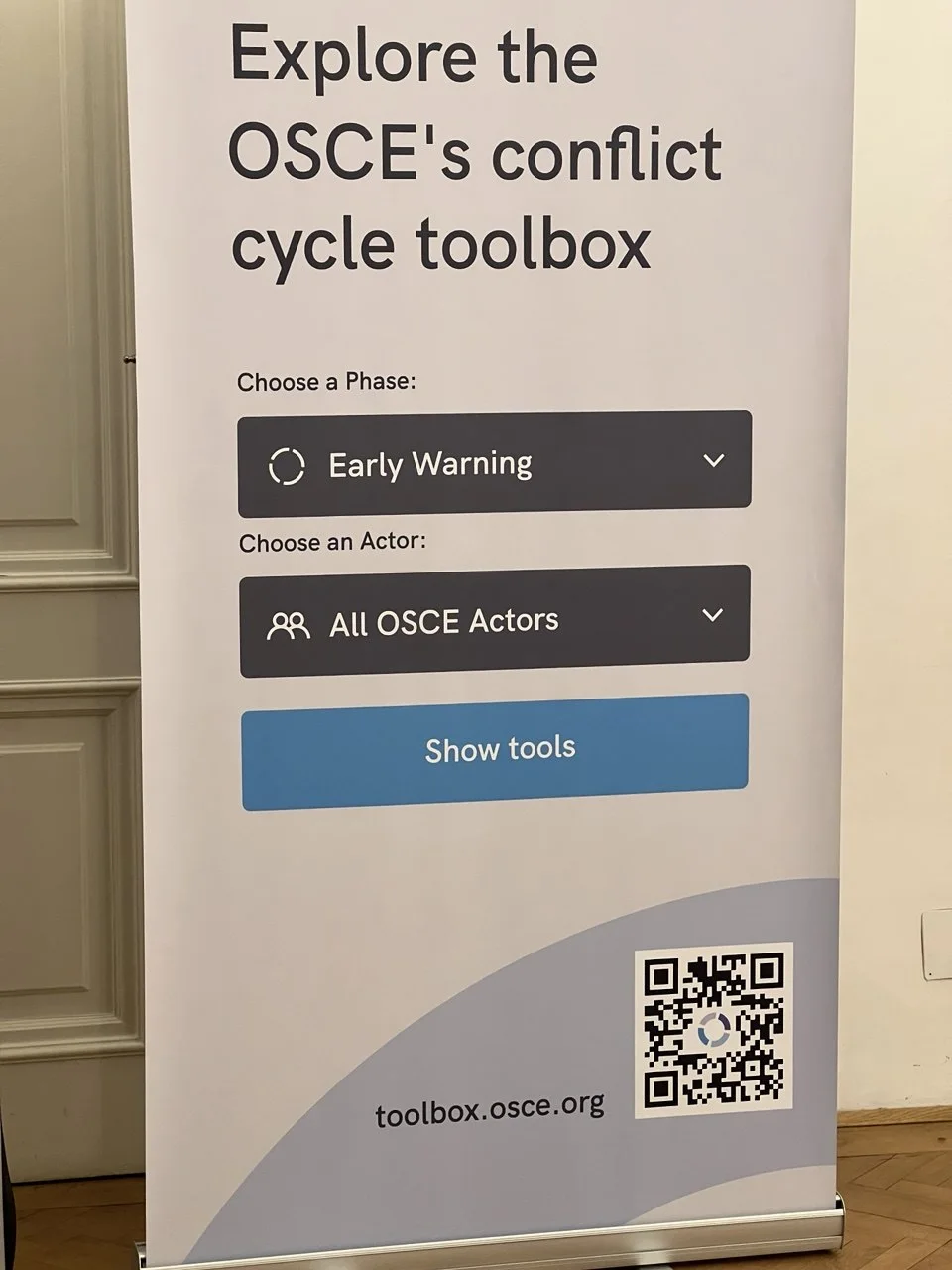 OSCE conflict cycle toolbox roll-up inside the Hofburg